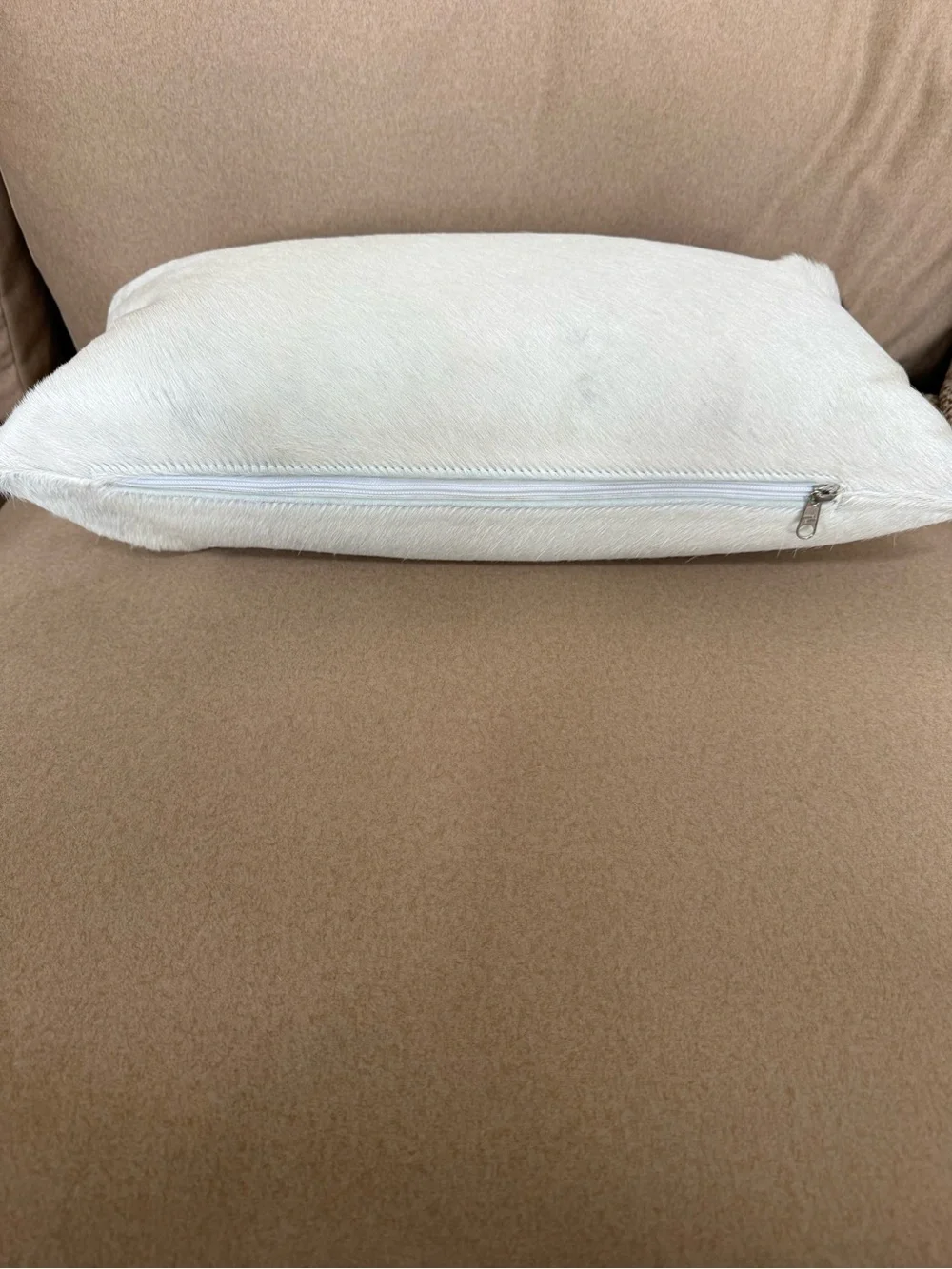 White Cowhide Lumbar Pillow with Dark Brown Accent
